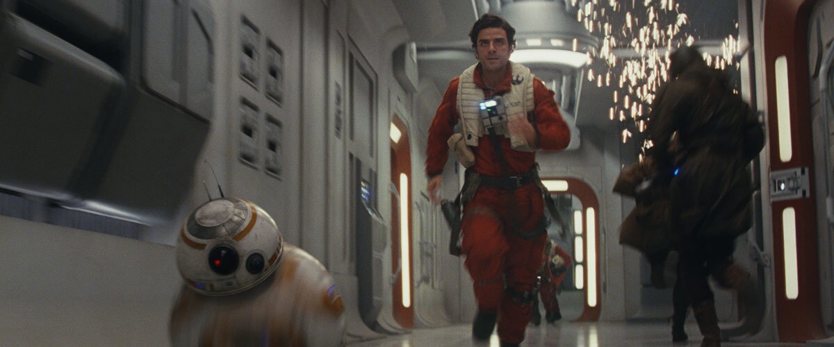 BB-8 and Poe Dameron rushing to reach Poe's X-Wing