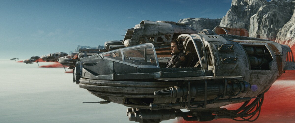 Poe Dameron piloting a Resistance ski speeder on Crait