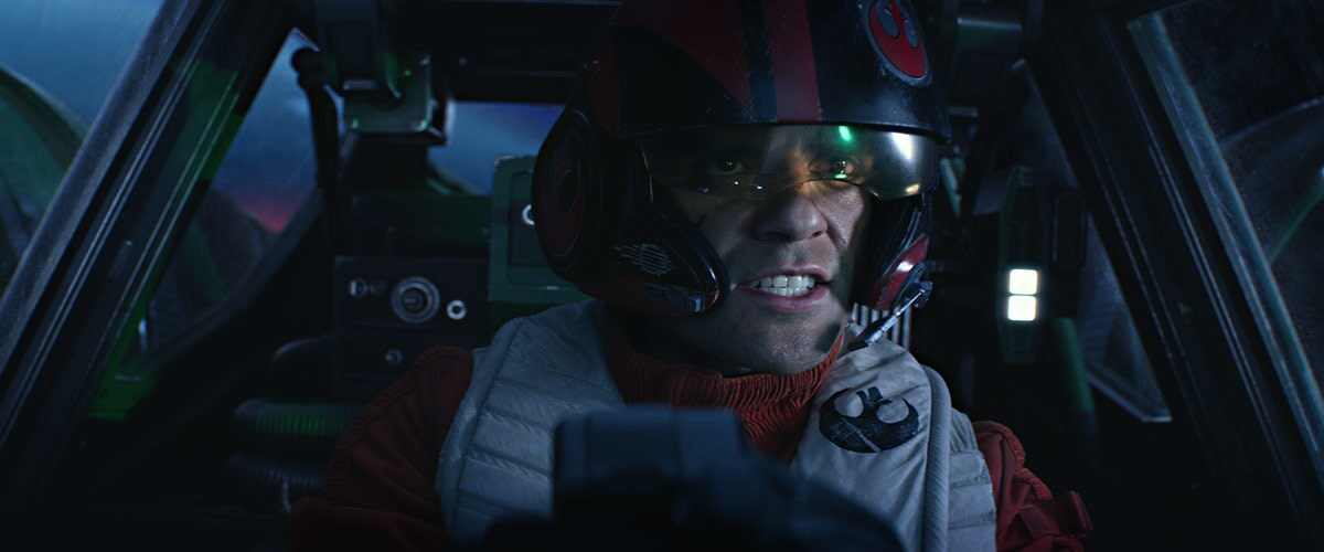 Poe Dameron pilotting an X-Wing starfighter during the assault on Starkiller Base