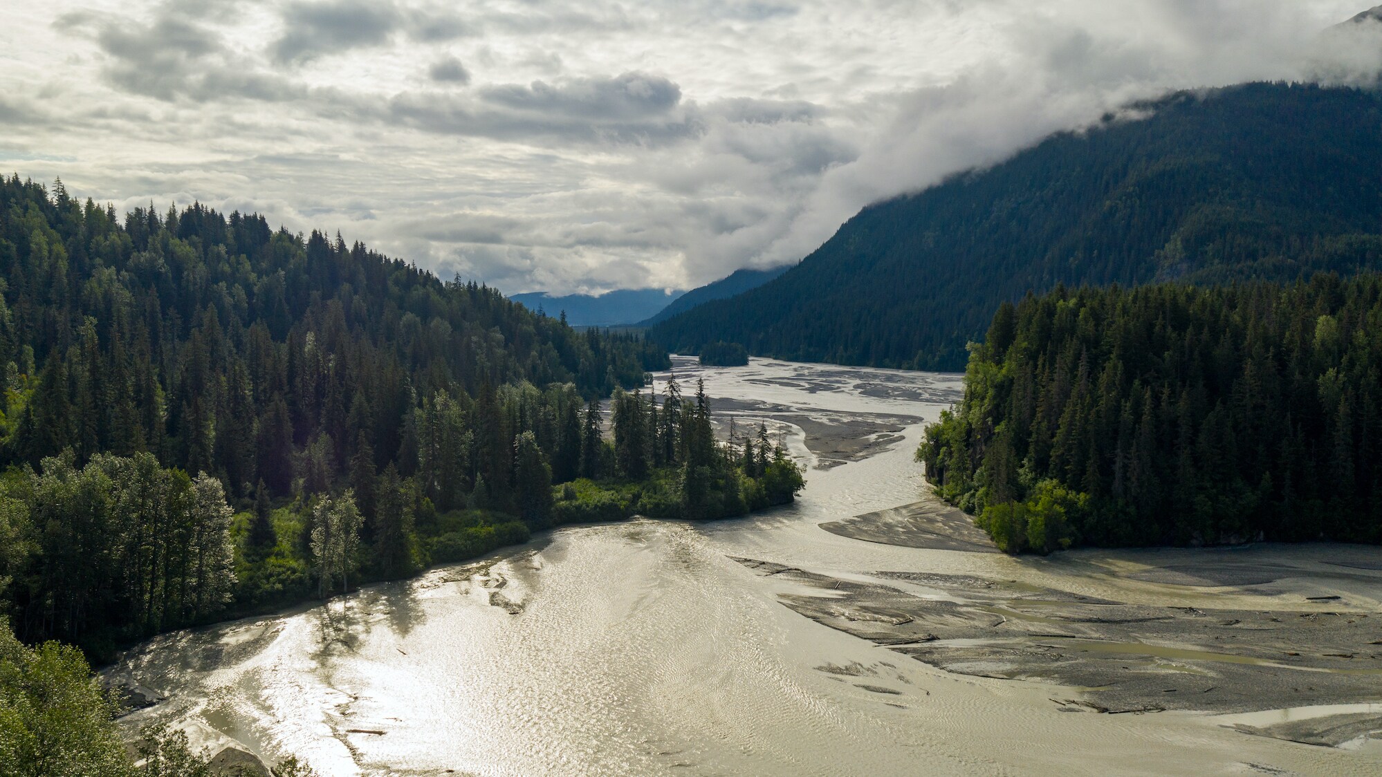 The Tsirku river as it enters the Alaskan rainforest.  (National Geographic for Disney+/Oliver Richards)