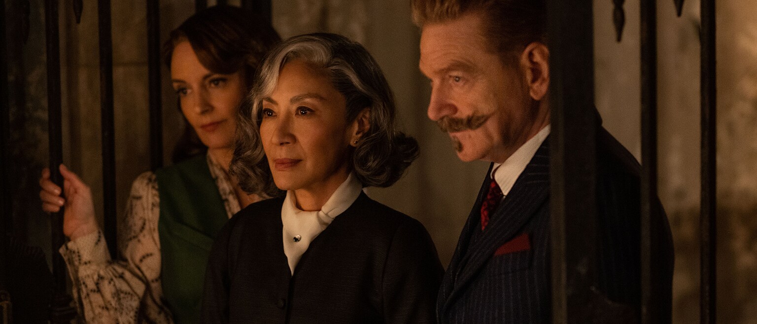 Image of Tina Fey, Michelle Yeoh, and Kenneth Branagh from the 20th Century Studios movie, "A Haunting in Venice."