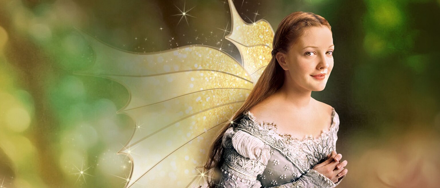 Image of Drew Barrymore with fairy wings from the 20th Century Studios movie, "Ever After: A Cinderella Story."