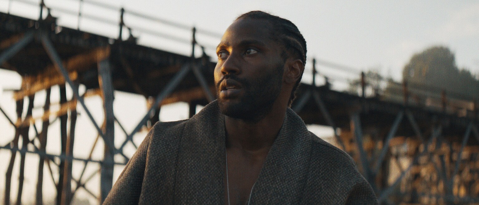 John David Washington as Joshua in 20th Century Studios' THE CREATOR. Photo courtesy of 20th Century Studios. © 2023 20th Century Studios. All Rights Reserved.