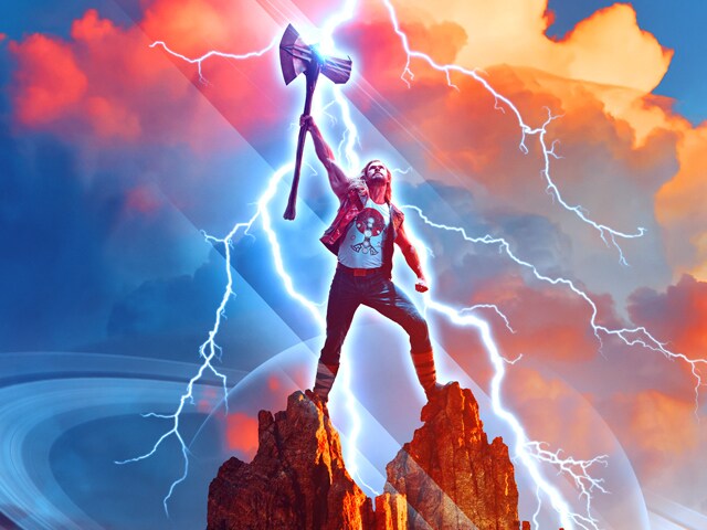Marvel Studios' Thor: stands on a mountaintop, channeling lightning through Mjolnir