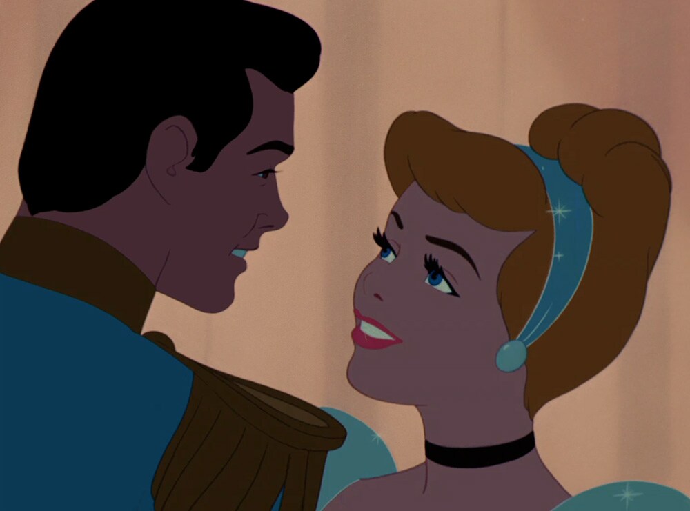 Animated characters Prince Charming and Cinderella dancing