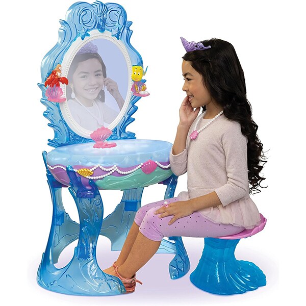 Photo of a girl sitting at the Disney Princess Playdate Ariel Bulk Vanity.