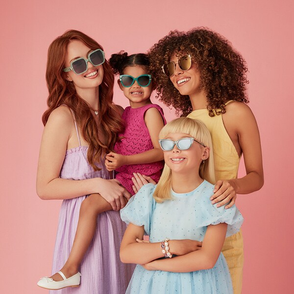 Image of four people wearing Diff Disney Princess Collection glasses.