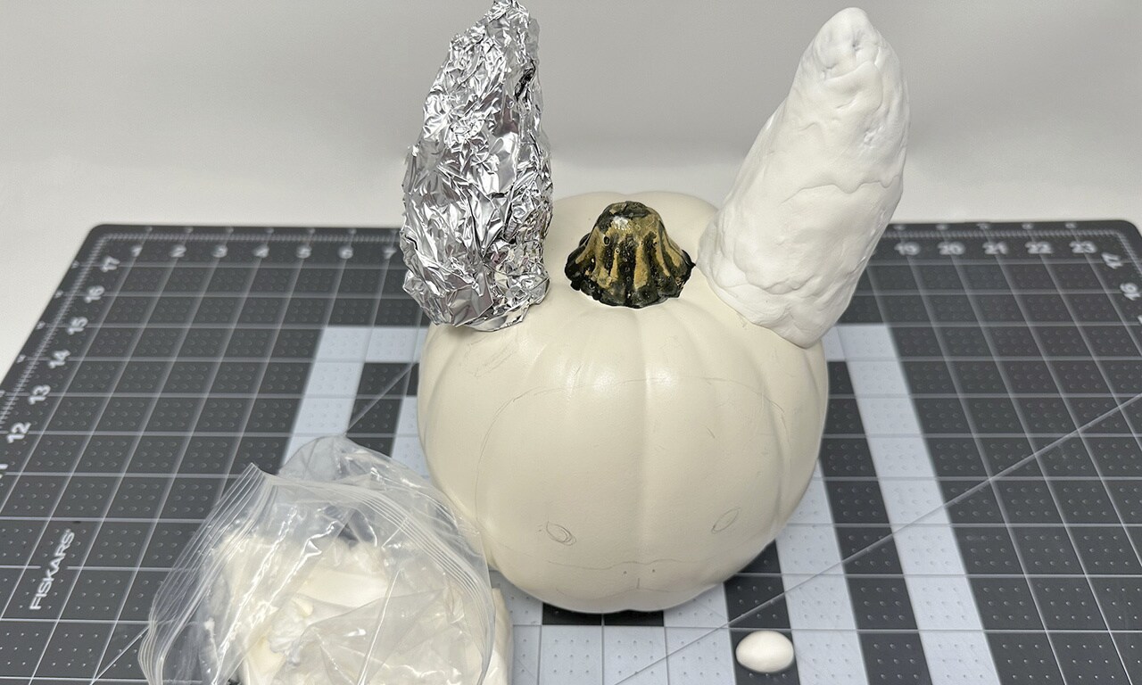 Cover the entire ear with the foam clay until none of the foil is visible.