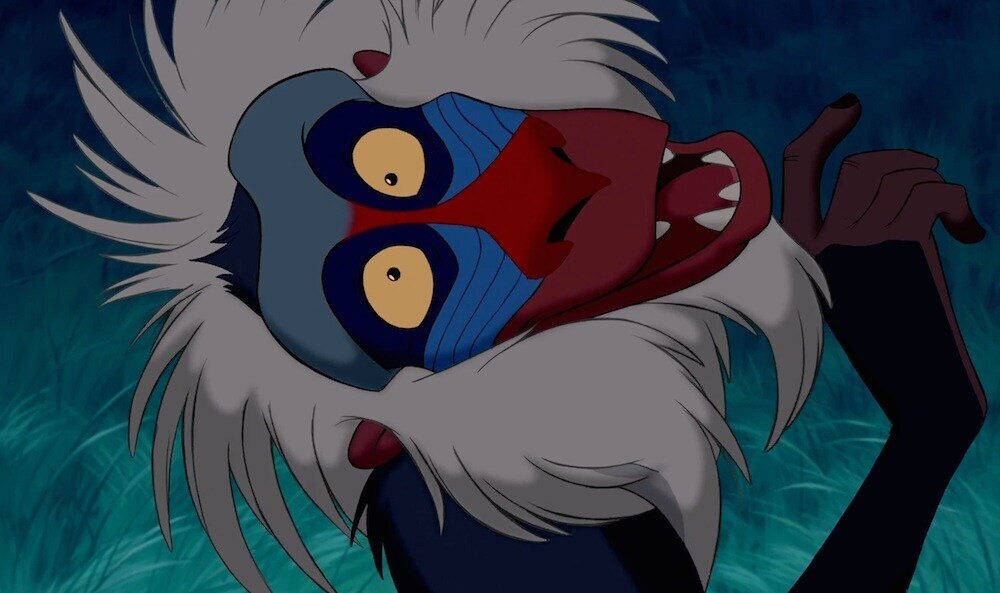 Animated characters Rafiki (baboon) from the movie "The Lion King"