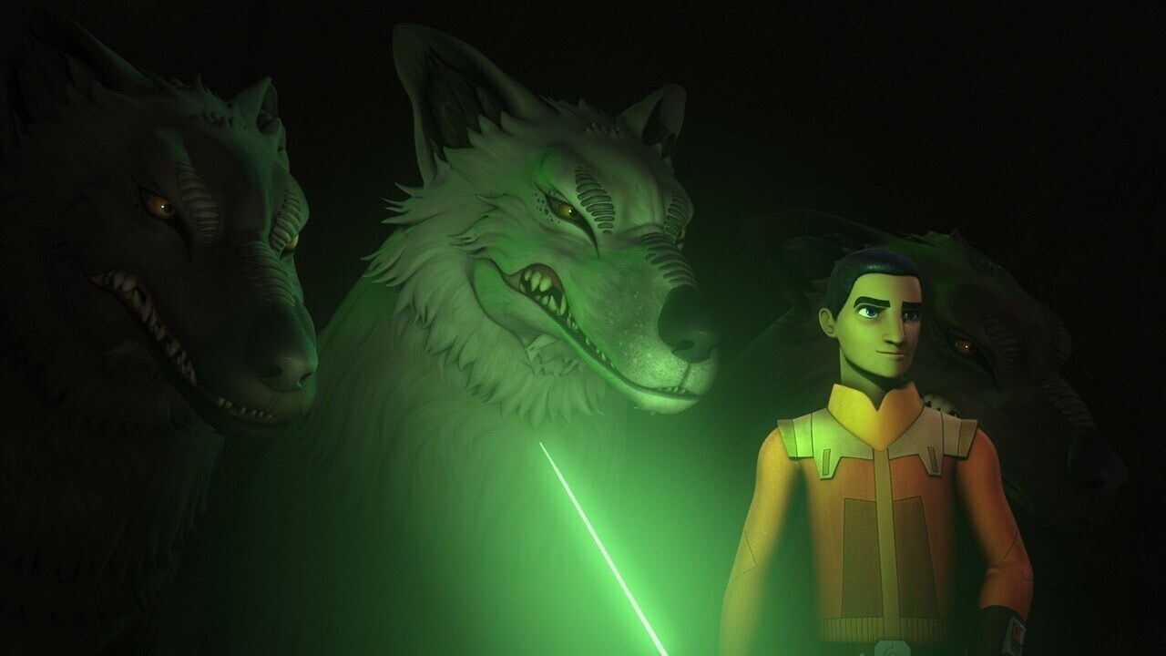 Ezra holding a lightsaber while standing next two Loth-Wolves