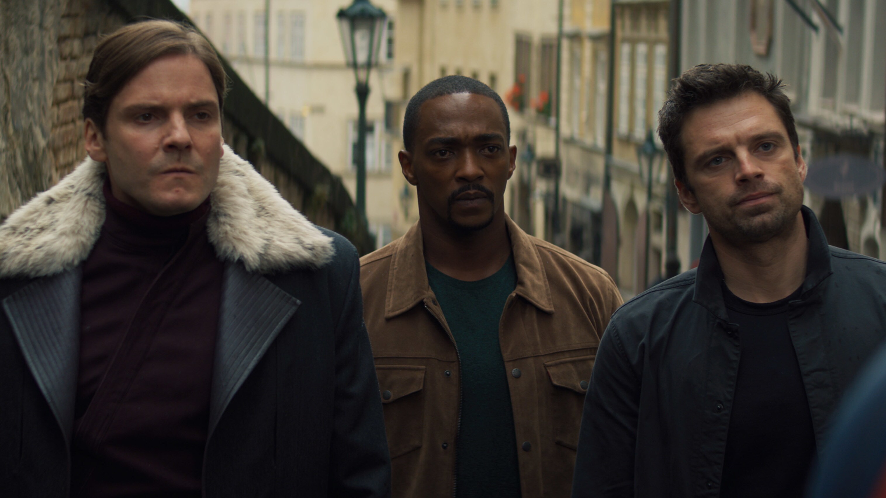(L-R): Zemo (Daniel Brühl), Falcon/Sam Wilson (Anthony Mackie) and Winter Soldier/Bucky Barnes (Sebastian Stan) in Marvel Studios' THE FALCON AND THE WINTER SOLDIER exclusively on Disney+. Photo courtesy of Marvel Studios. ©Marvel Studios 2021. All Rights Reserved.