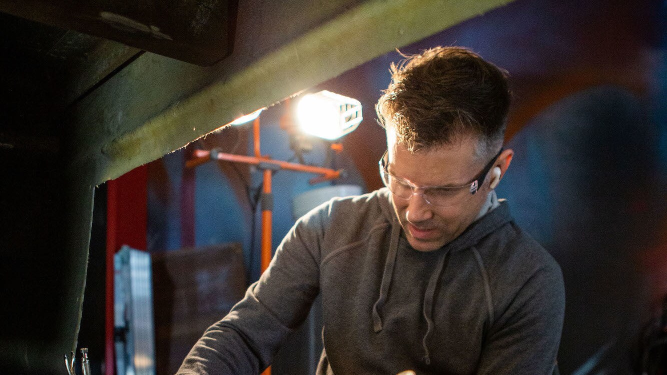 Builder Nick works on a vehicle as seen on Disney's RENNERVATIONS. (Disney/Nina Riggio)