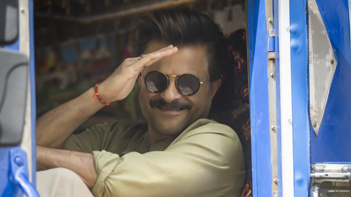 Anil Kapoor helps deliver the completed water treatment truck in Alwar, Rajasthan, India, as seen on Disney's RENNERVATIONS. (Disney/Mansi Midha)