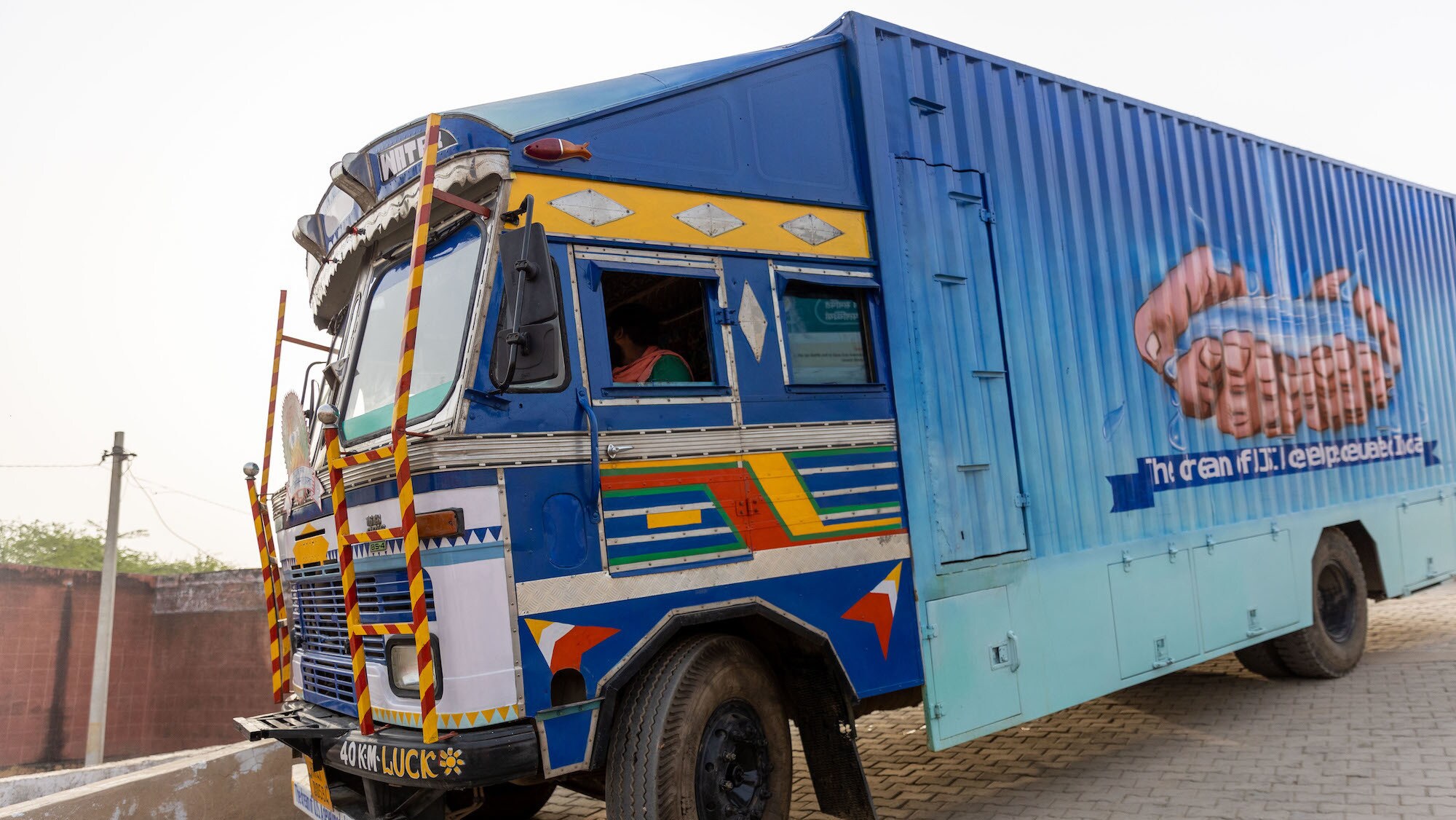 The completed water treatment truck is delivered in Alwar, Rajasthan, India, as seen on Disney's RENNERVATIONS. (Disney/Mansi Midha)