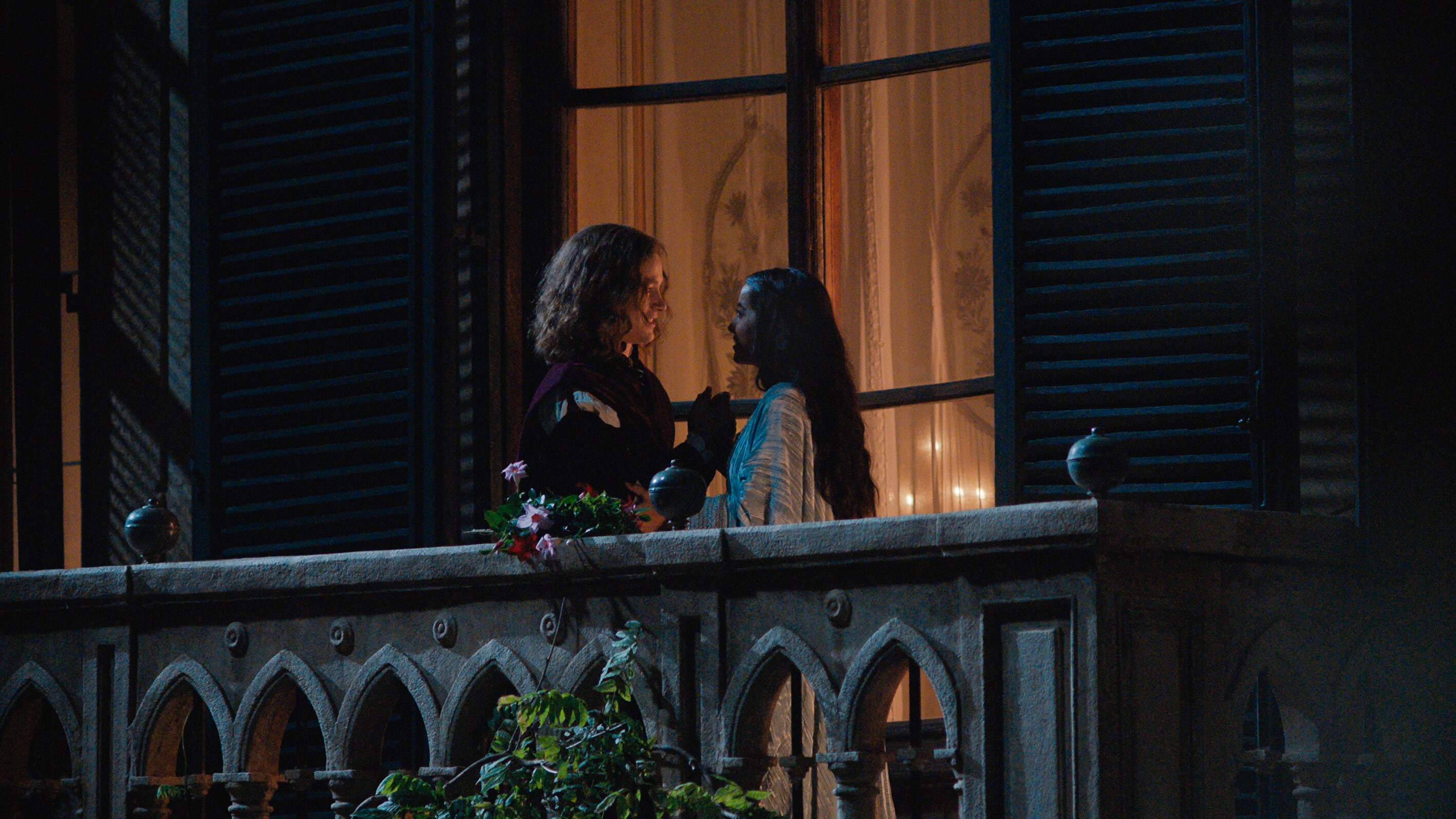Romeo and Juliet on balcony.