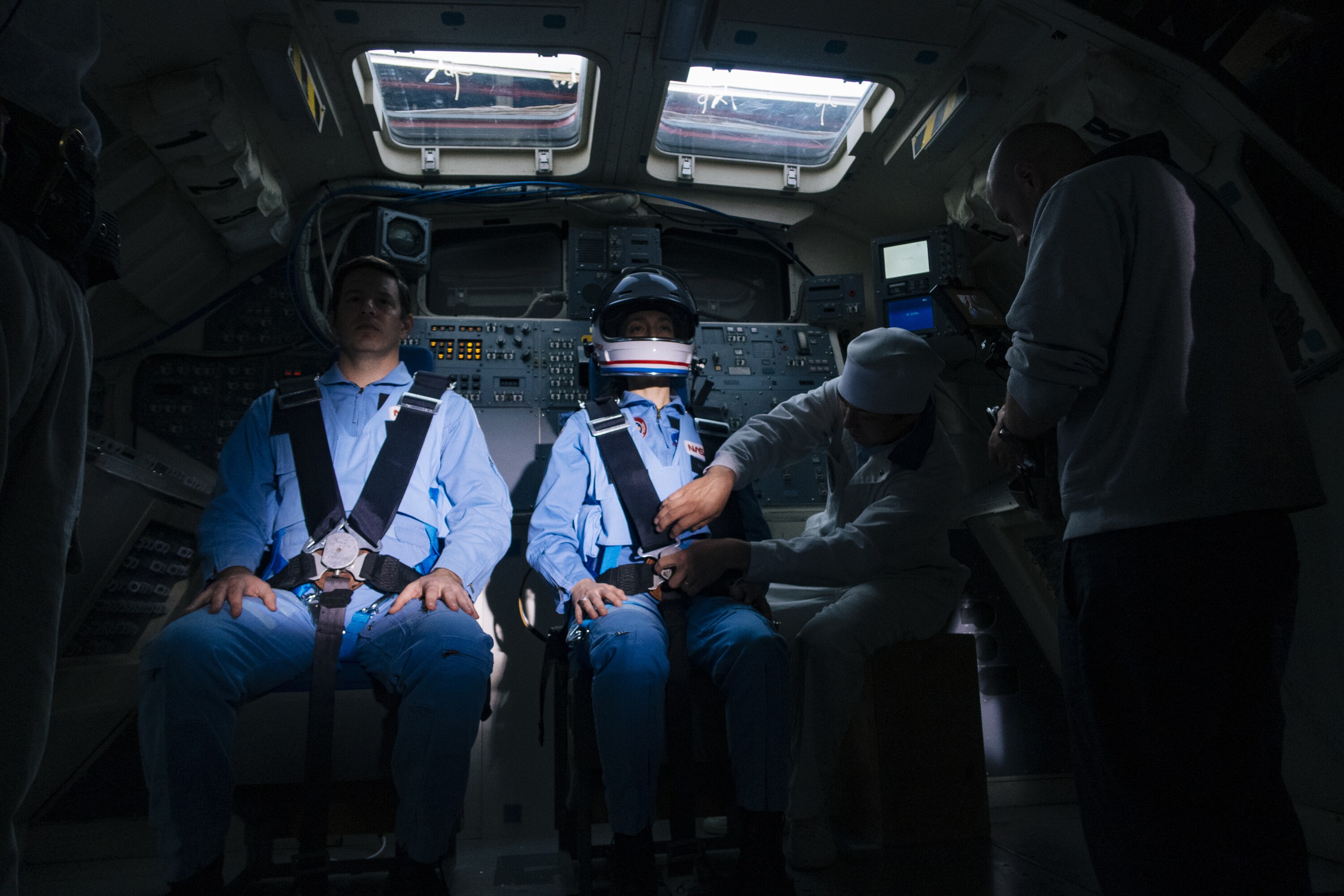 Behind-the-scenes of a studio recreation of Astronaut Sally Ride getting buckled into the shuttle of the STS-7 launch. (Credit: National Geographic/Parker Hill)