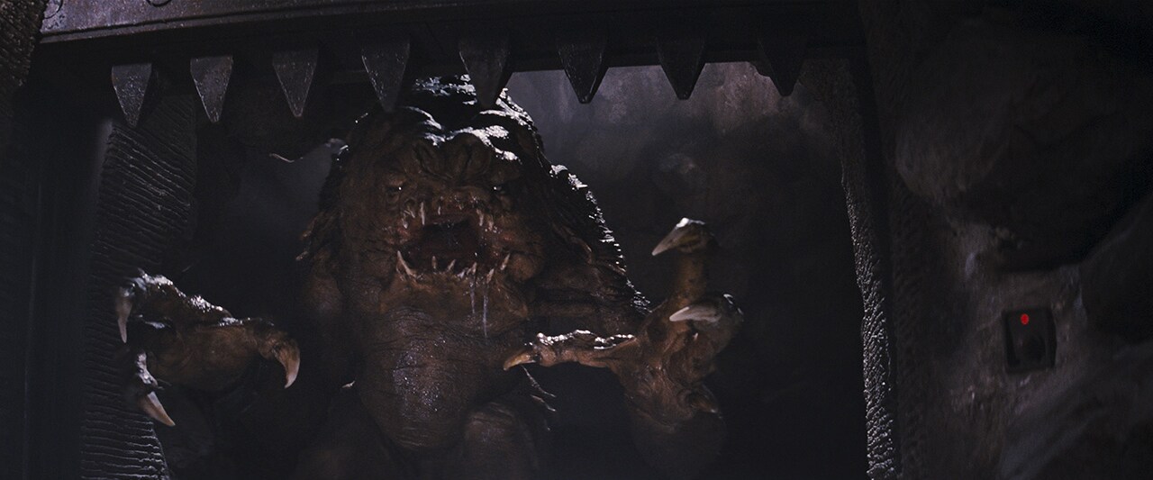 A rancor attacks Luke