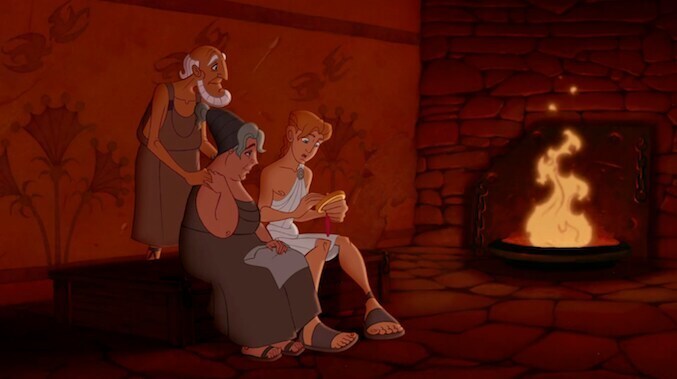 Hercules sitting next to a fire with his family in the animated film "Hercules"