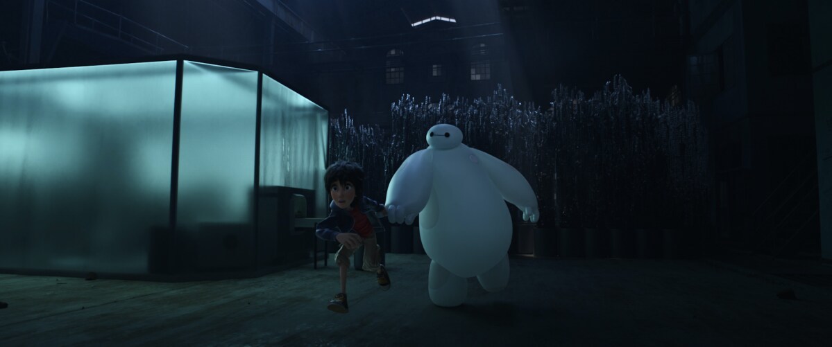 Baymax and Hiro running in the animated movie "Big Hero 6"