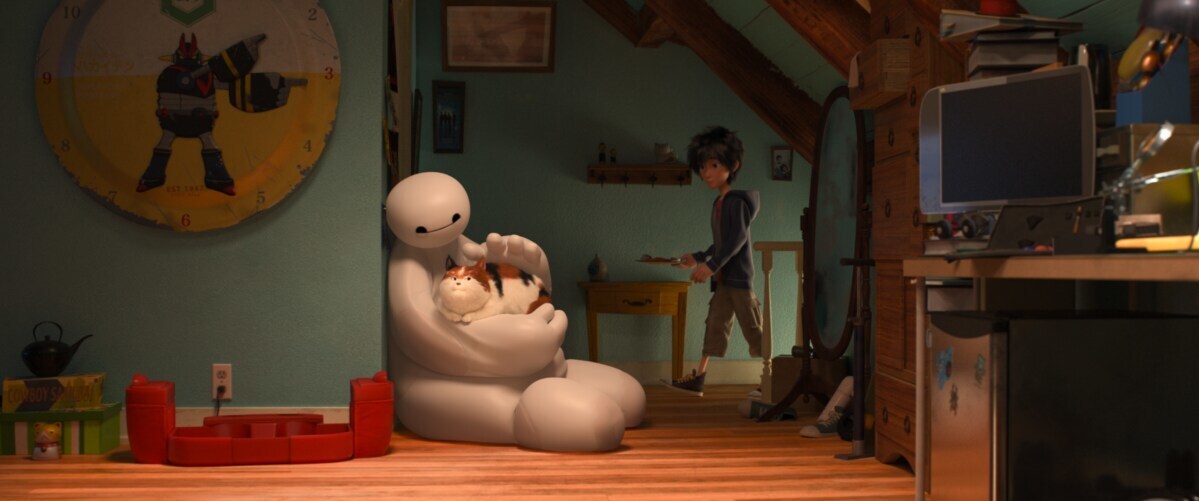 Baymax sitting on the floor comforting a cat in the animated movie "Big Hero 6"