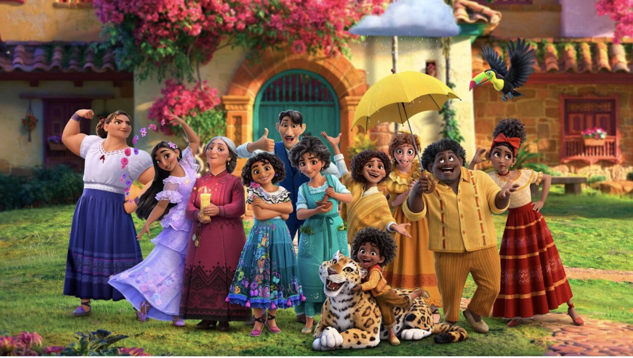 The entire Madrigal Family pose for a picture in Walt Disney Animation Studios' Encanto