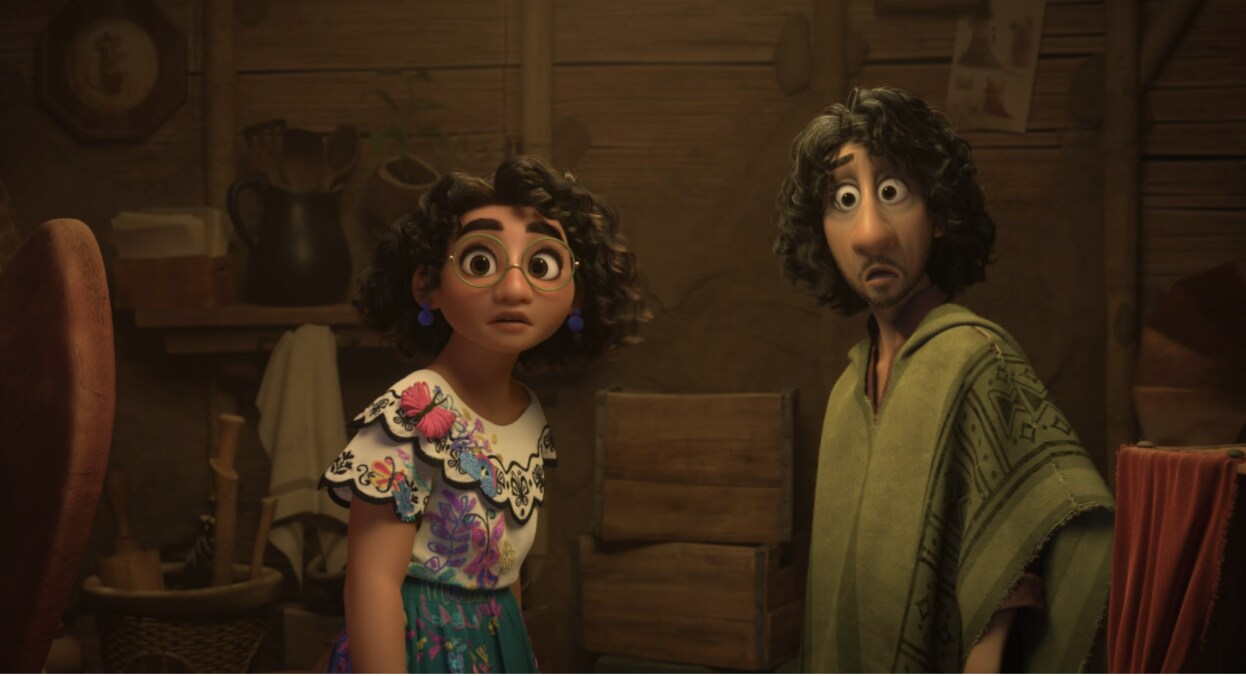 Mirabel and Uncle Bruno look surprised in Walt Disney Animation Studios' Encanto