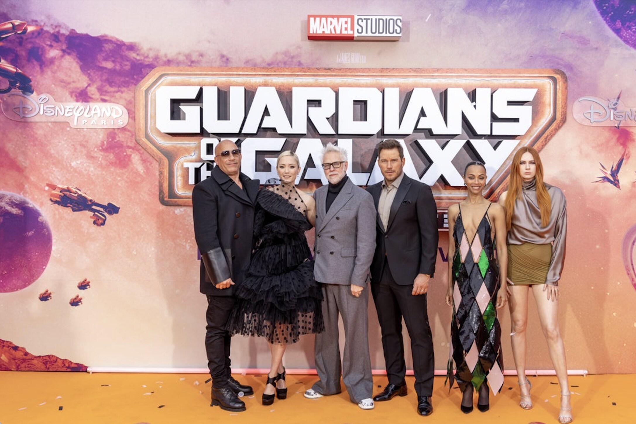 Vin Diesel, Pom Klementieff, James Gunn, Chris Pratt, Zoe Saldana and Karen Gillan in front of photoboard at European Gala Event of Guardians of the Galaxy Vol.3
