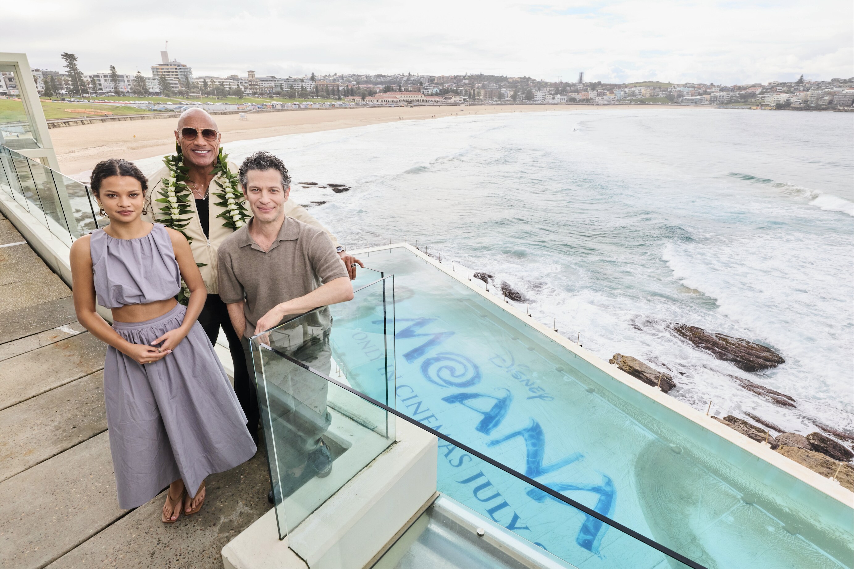 Dwayne Johnson, Catherine Laga'aia and Thomas Kail at Bondi Beach