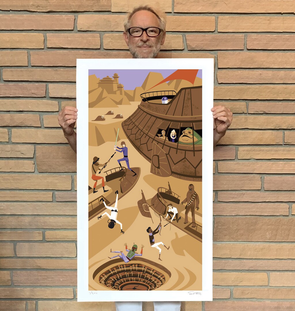 Josh Agle, a.k.a. SHAG, holding a Return of the Jedi print