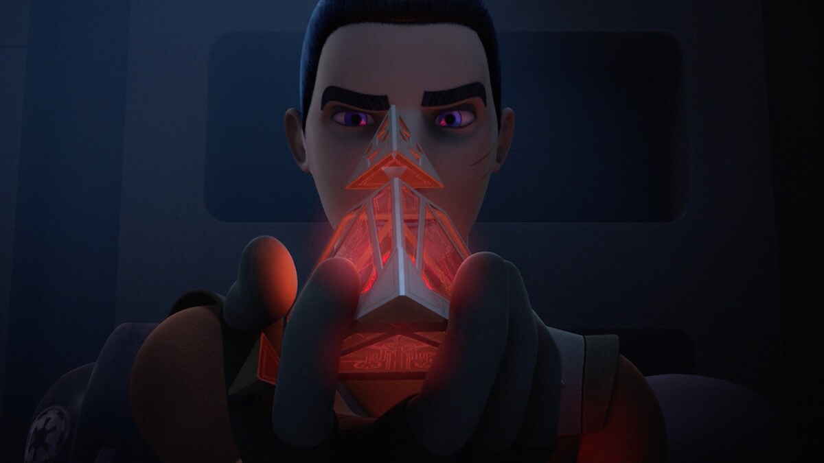 Ezra Bridger holding a Sith holocron