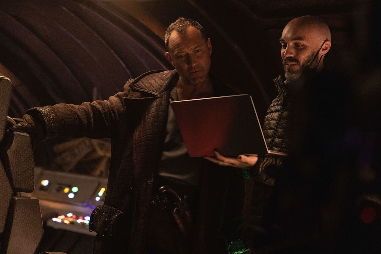 (L-R) Jude Law and David Lowery on the set of Lucasfilm's Star Wars: Skeleton Crew.