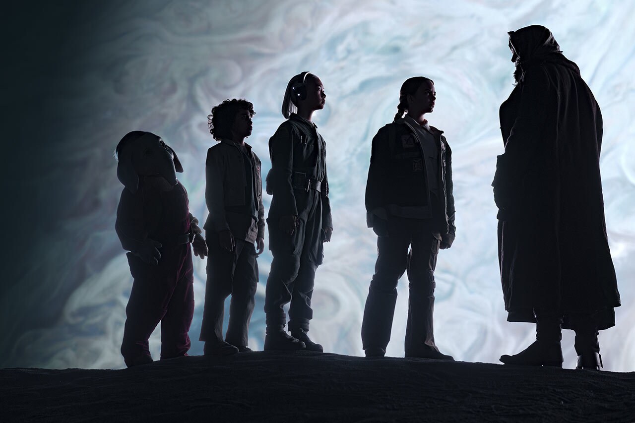 Wim (Ravi Cabot-Conyers), Jod Na Nawood (Jude Law), KB (Kyriana Kratter), Neel (Robert Timothy Smith), and Fern (Ryan Kiera Armstrong) in Star Wars: Skeleton Crew.