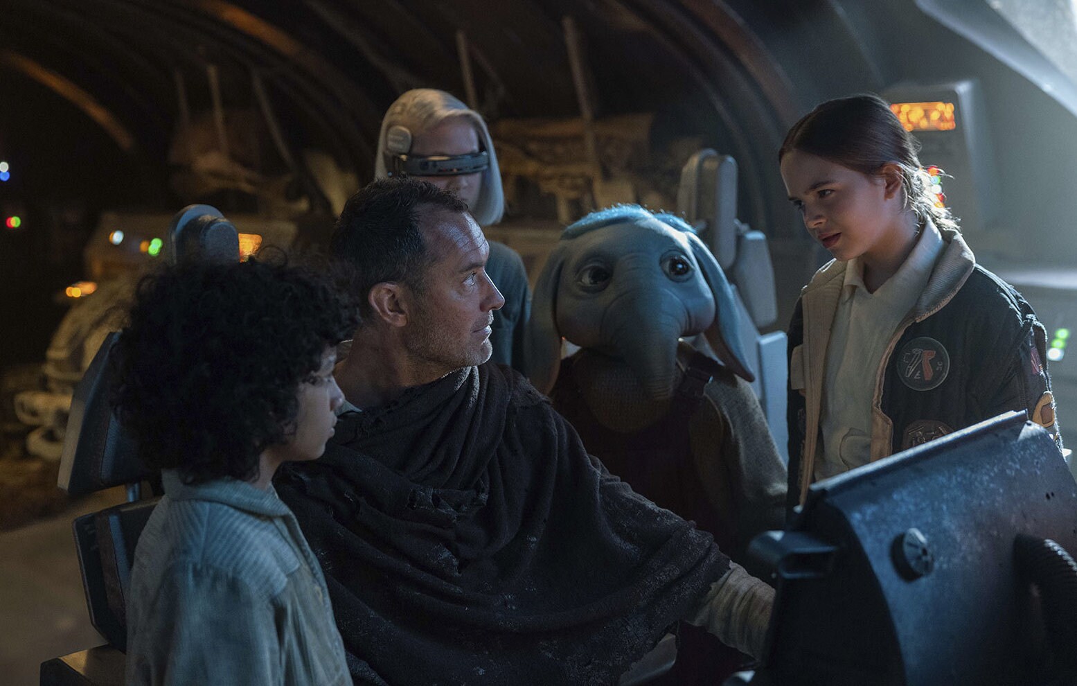 (L-R): Wim (Ravi Cabot-Conyers), Jod Na Nawood (Jude Law), KB (Kyriana Kratter), Neel (Robert Timothy Smith), and Fern (Ryan Kiera Armstrong) in Star Wars: Skeleton Crew. 