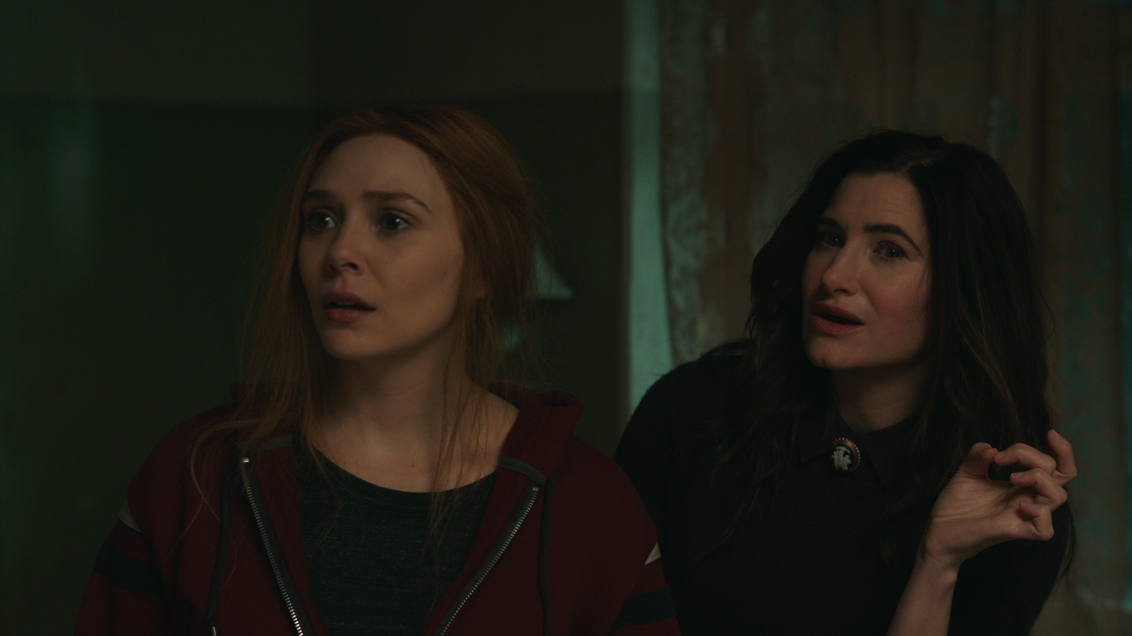 (L-R): Elizabeth Olsen as Wanda Maximoff and Kathryn Hahn as Agatha Harkness in Marvel Studios' WANDAVISION exclusively on Disney+. Photo courtesy of Marvel Studios. ©Marvel Studios 2021. All Rights Reserved.