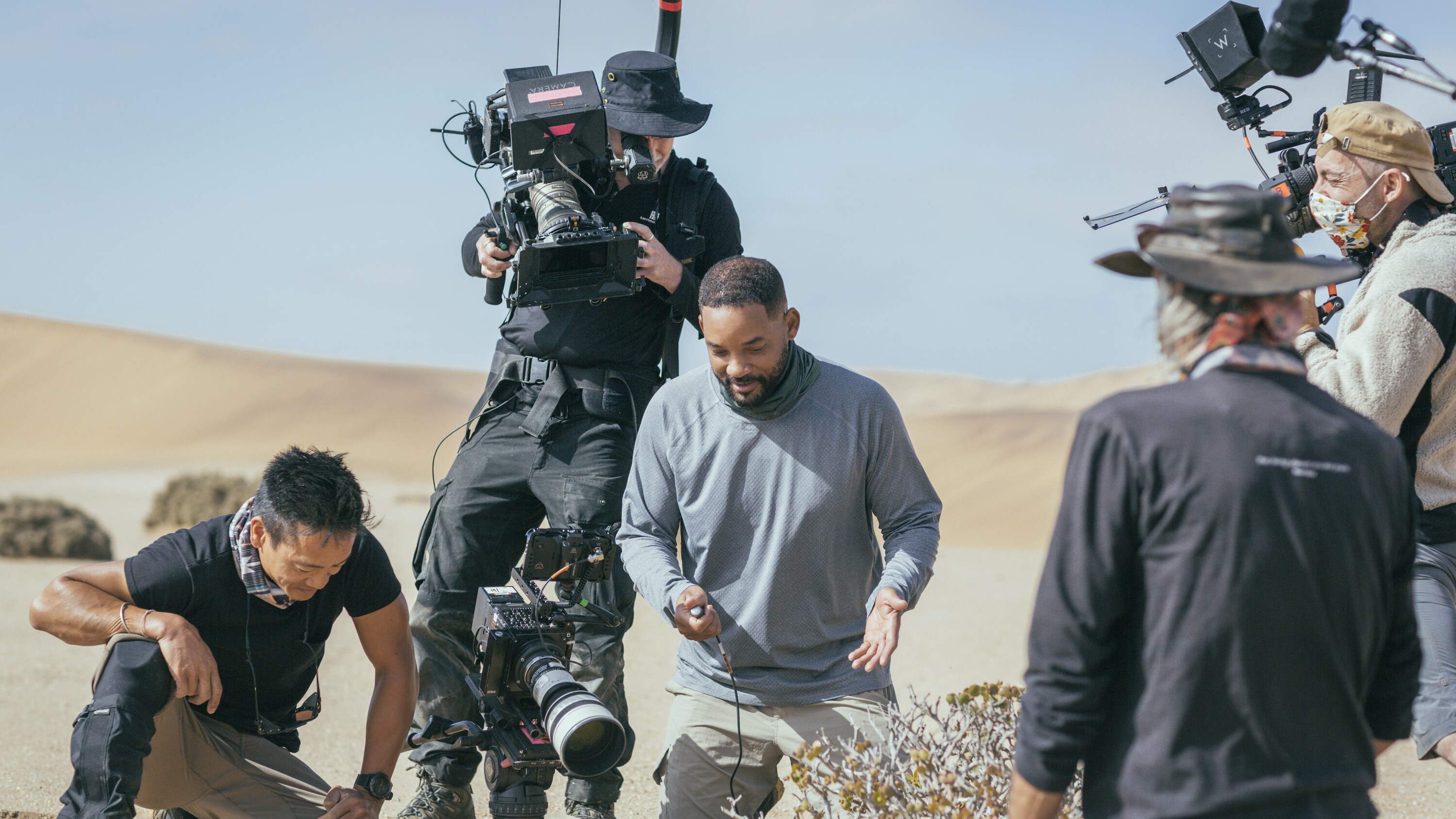 Will Smith and Explorer Albert Lin attempting to capture the feeding behavior of the Namaqua chameleon, using a slow motion phantom camera.  (National Geographic/Freddie Claire)