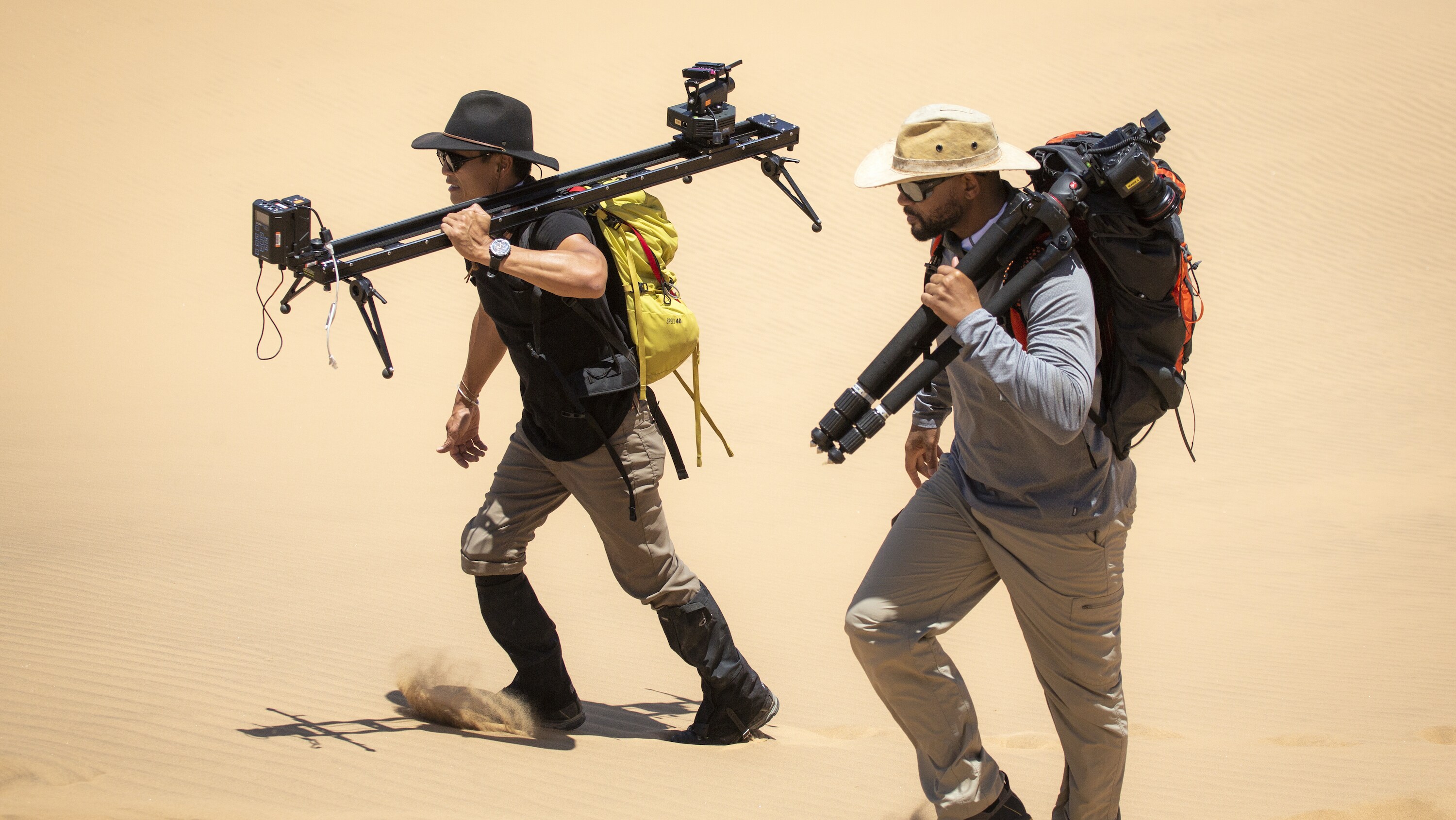 Will Smith and Explorer Albert Lin collecting Albert's timelapse gear from one of top of one of the highest sand dunes in the world.  (National Geographic/Freddie Claire)