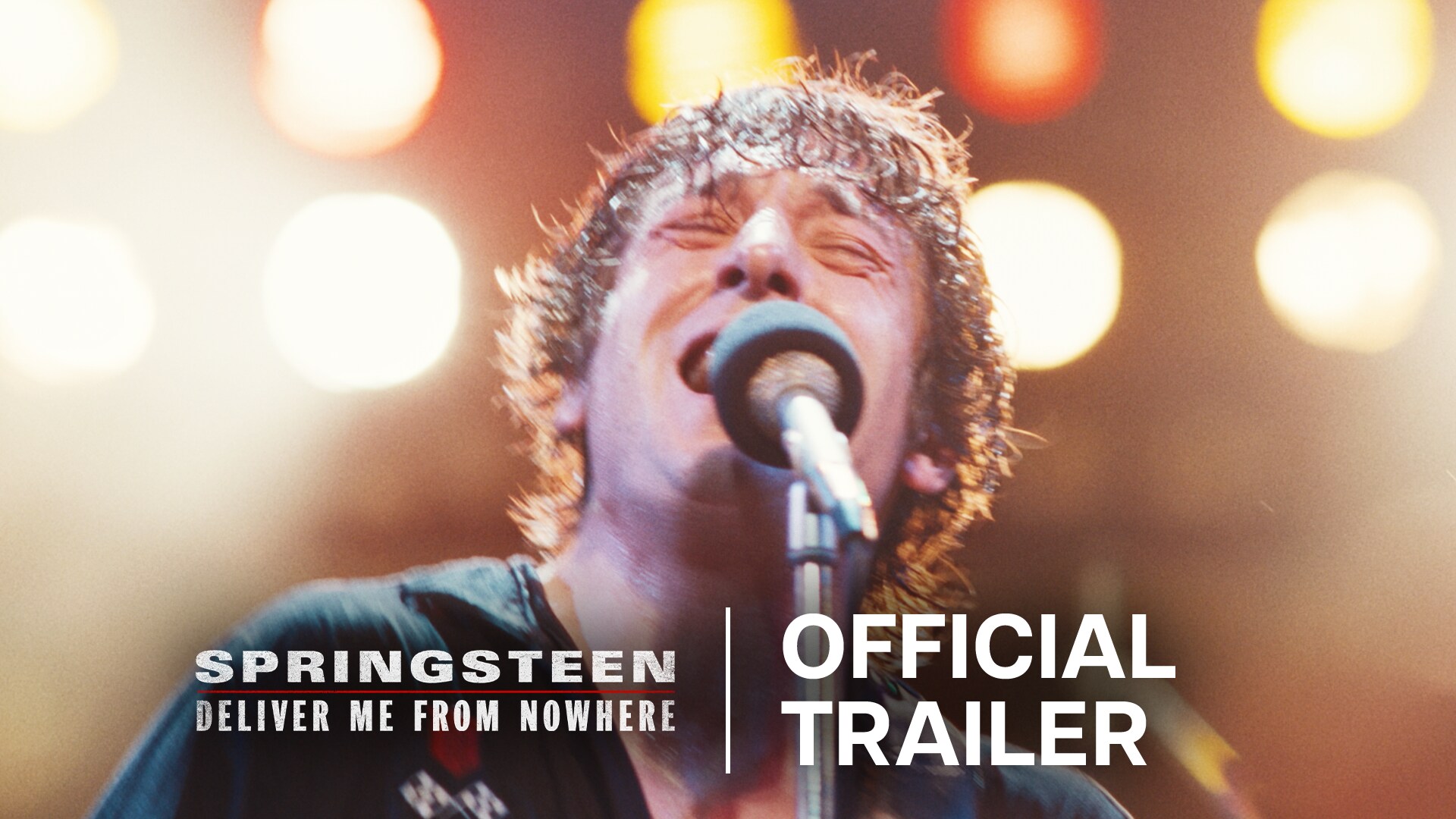 Image of Bruce Springsteen (Jeremy Allen White) singing into a microphone. | Springsteen: Deliver Me From Nowhere | Official trailer