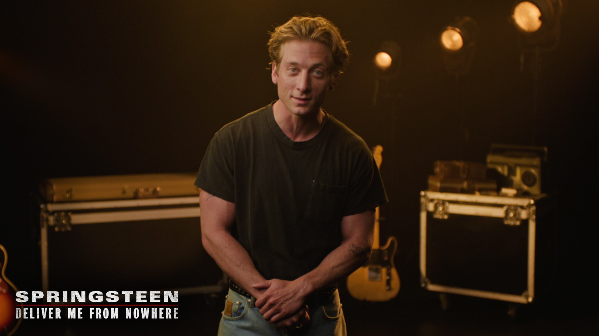 Image actor Jeremy Allen White standing in front of amplifiers and a guitar. | 20th Century Studios | Springsteen: Deliver Me From Nowhere | Get tickets now | In theaters Oct. 24