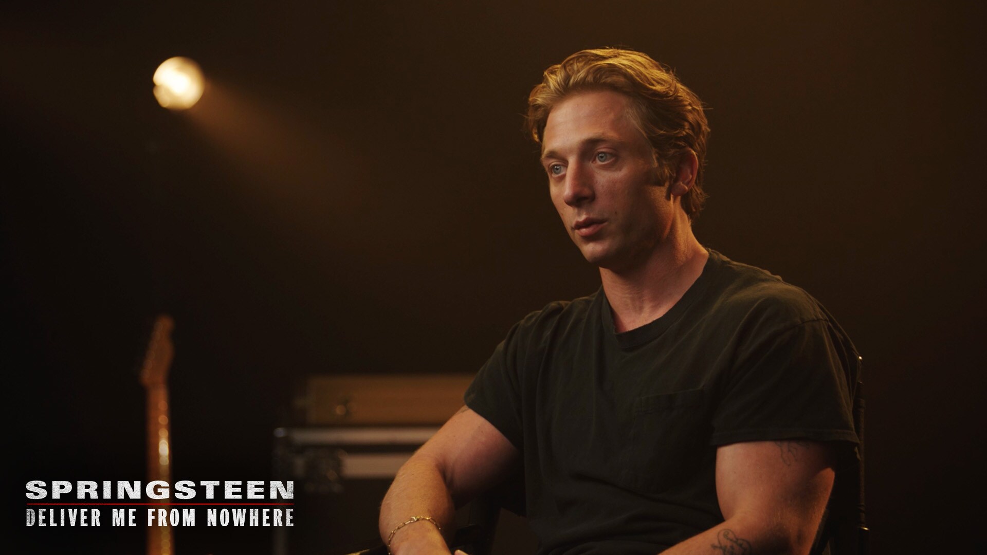 Image of actor Jeremy Allen White sitting down. | 20th Century Studios | Springsteen: Deliver Me From Nowhere | Process