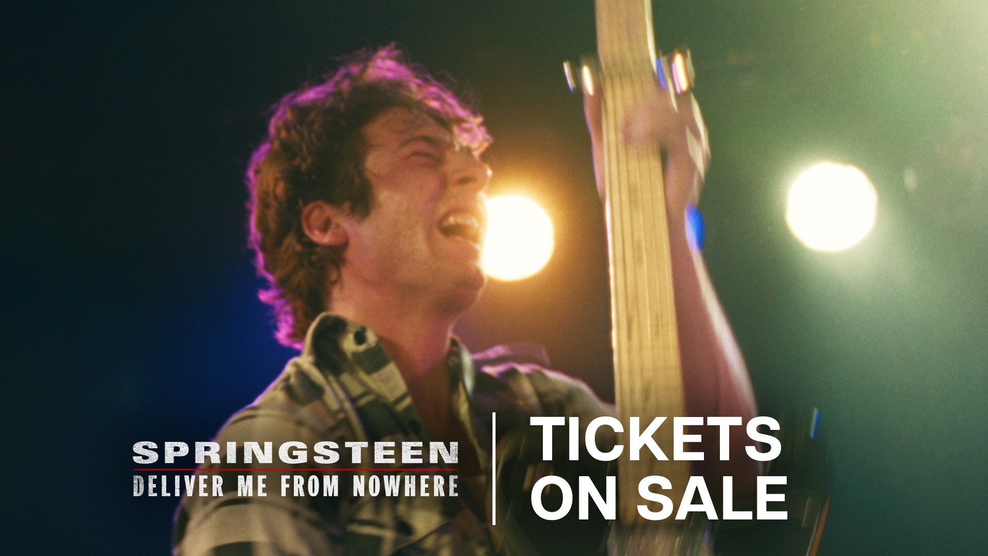 Image of Bruce Springsteen (actor Jeremy Allen White) playing a guitar vertically while singing. | 20th Century Studios | Springsteen: Deliver Me From Nowhere | Tickets on sale