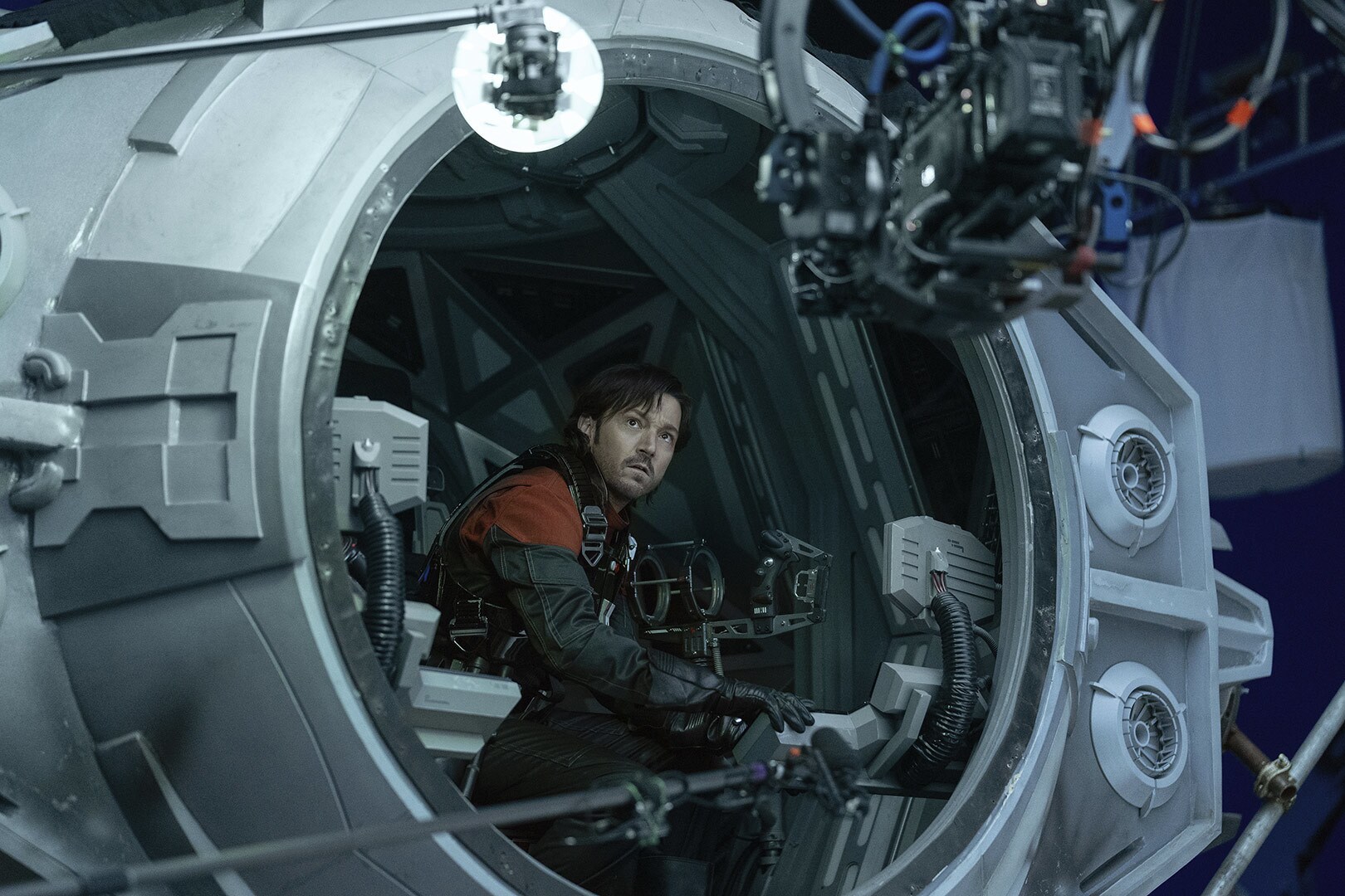 Cassian Andor (Diego Luna) on the set of Andor Season 2 in the full-scale TIE Avenger set.