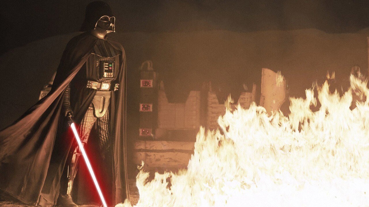 Vader standing over the fire