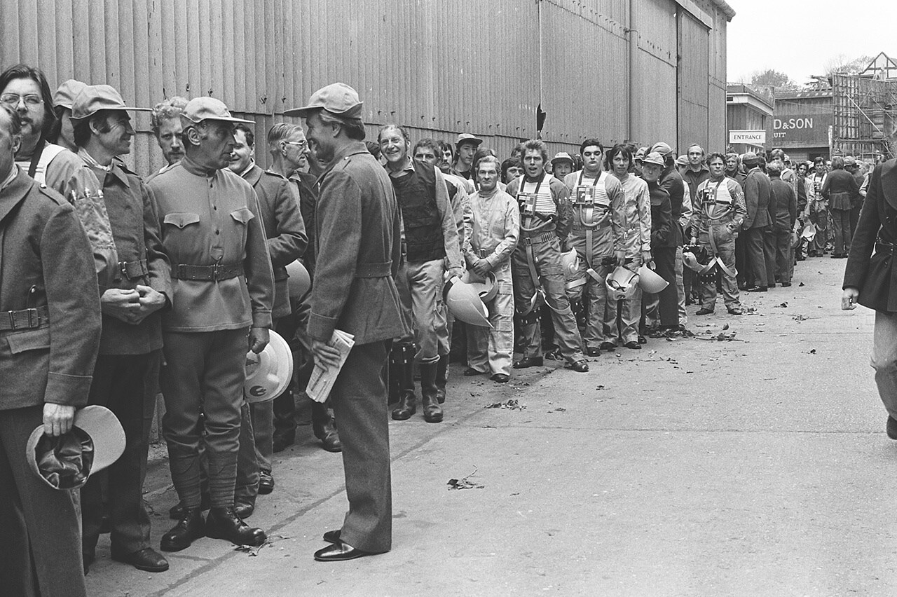 Rebel extras line up outside a stage at Shepperton Studios during production of Star Wars: A New Hope.