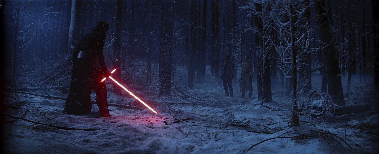 Kylo Ren pursues Rey and Finn in Star Wars: The Force Awakens.