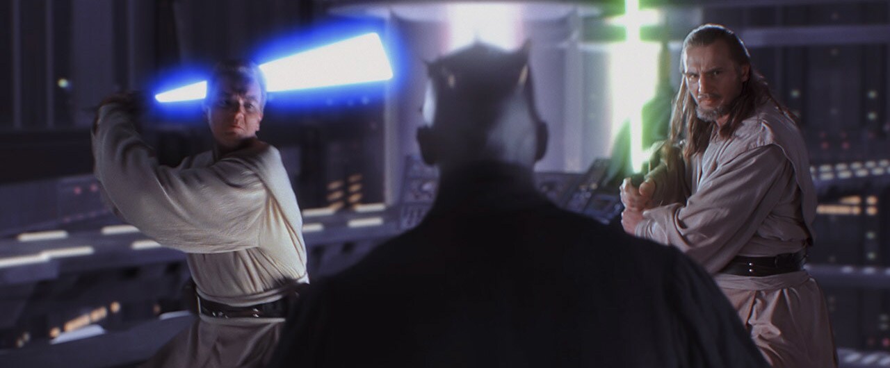 Obi-Wan Kenobi and Qui-Gon Jinn fight Darth Maul across a series of catwalks and barriers in Star Wars: The Phantom Menace.