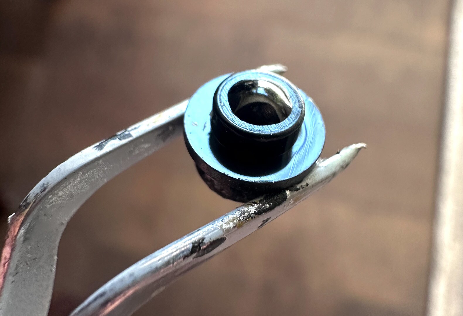 Small LEGO pieces with a single drop of clear, hardened resin made for effective lenses to help amplify the fiber optic lights.