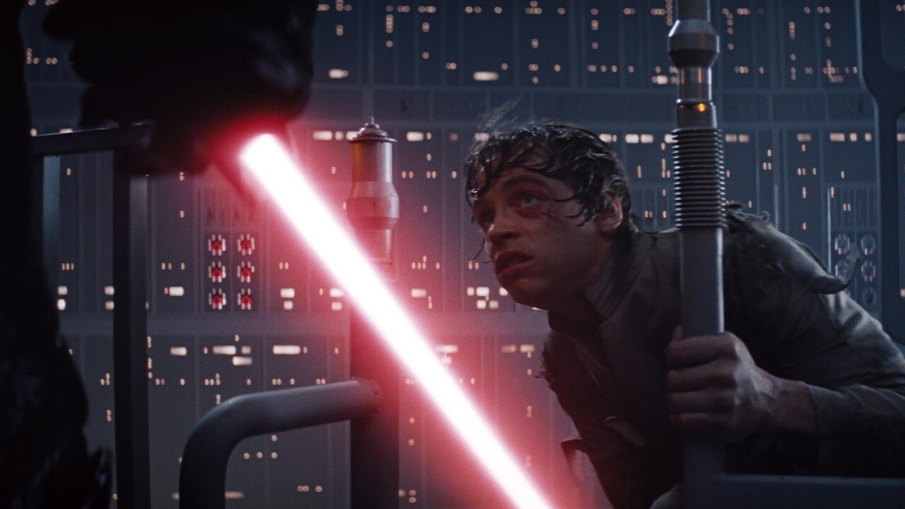 Vader lightsaber drawn confronts Luke