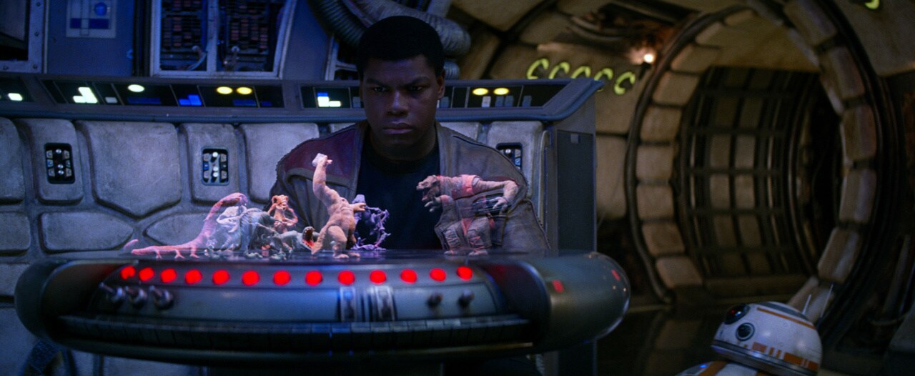 Finn accidently activates the holochess table on the Millennium Falcon.