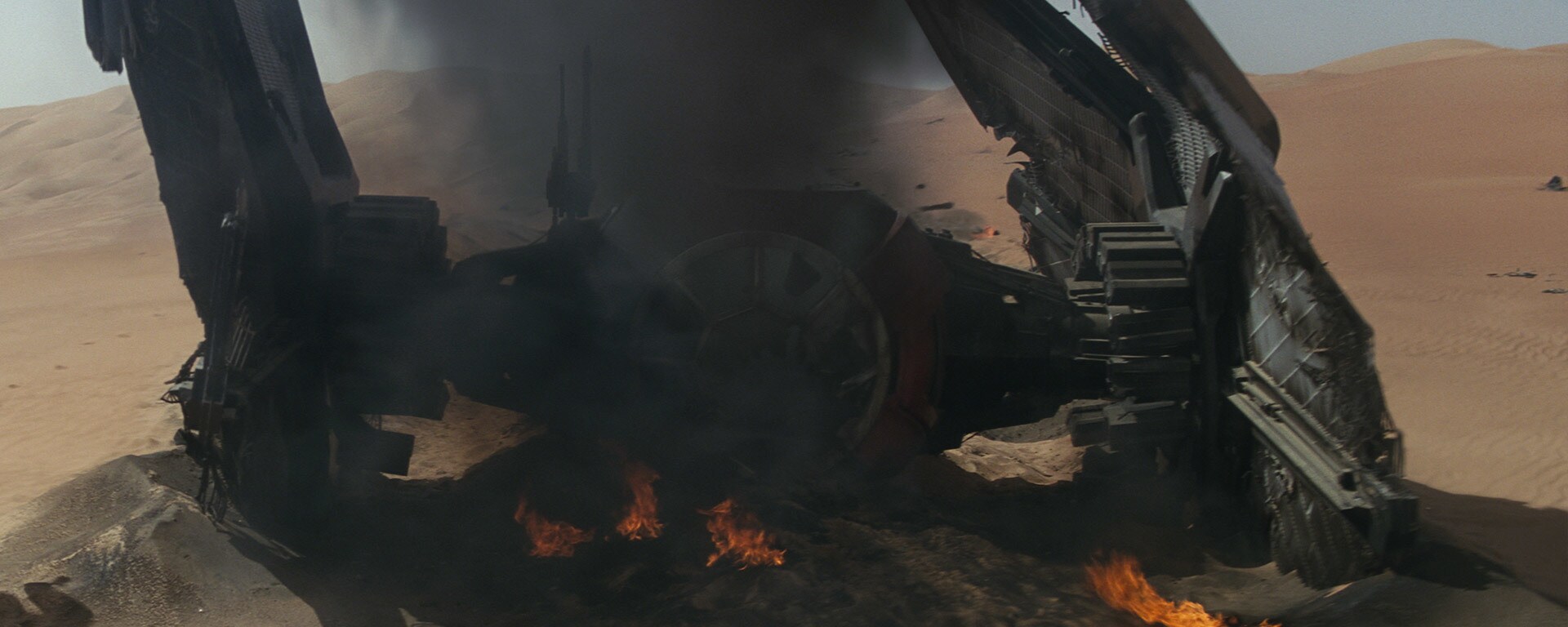 The burned-out wreckage of a Special Forces TIE fighter on Jakku.