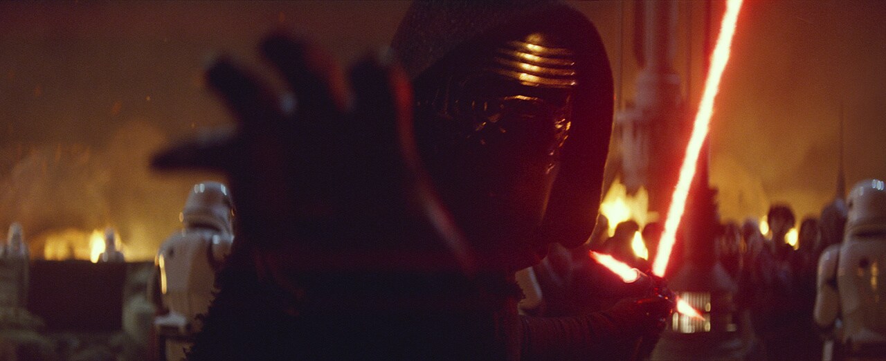 Kylo Ren freezes a blaster fire in mid-air as Dameron is taken into custody.